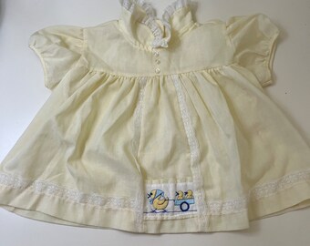 Fawn Tops, Dainty, Yellow dress with Momma Duck pulling baby ducks in a wagon. (missing the matching bloomers)