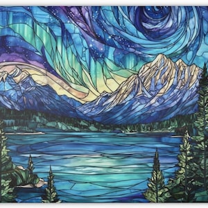 Overhead flat lay of mountain arora borealis cutting board with lake landscape