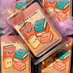 May include: Wax melts in a clear plastic container with a label saying "Vintage Bookstore." The label shows cartoon books in orange, green, and yellow. The text "Pretty P Melts & Candles" is also visible on the label.