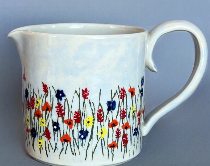 Handmade Wildflower Pottery Pitcher: Embossed Floral Design