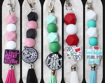 silicone keychains focal bead, sips, trips target, skull, match energy, Starbucks scull, thick thirty, keychain, mom, anti social, cute, fun