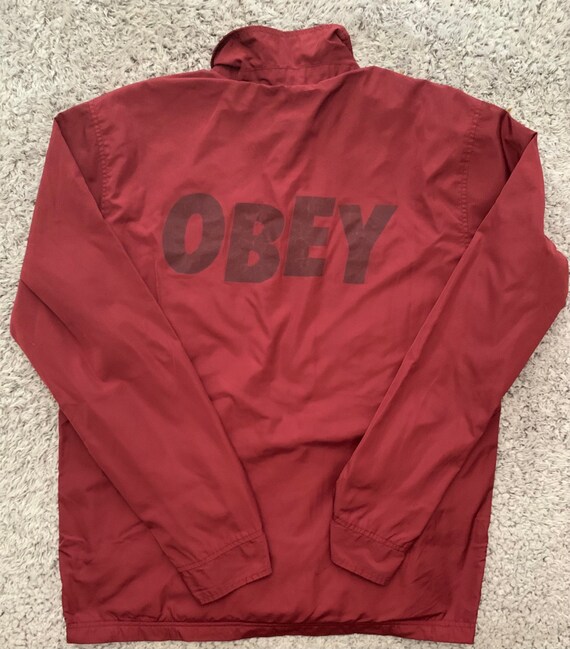 obey red windbreaker