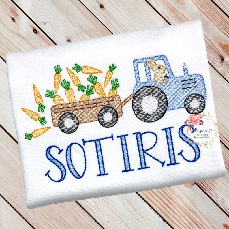 May include: A blue tractor with a bunny driver pulling a wagon full of carrots. The wagon is labeled with the name "SOTIRIS".