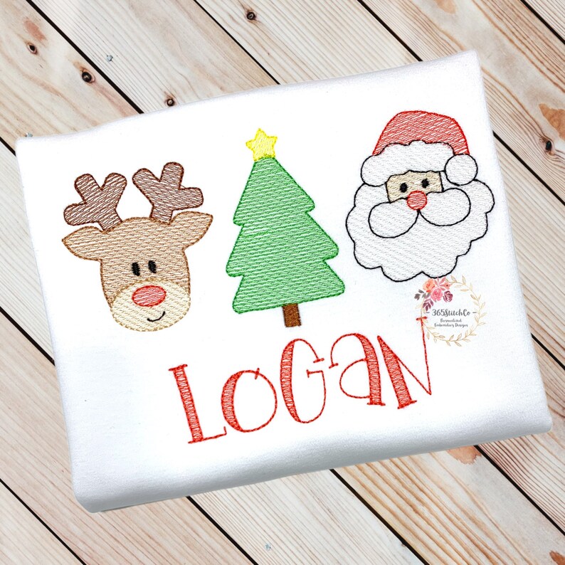 May include: A white embroidered Christmas shirt featuring a red reindeer, green Christmas tree, and Santa Claus face. The name "Logan" is embroidered in red below the images.