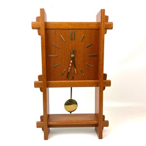 Fantastisk dansk modern väggklocka i teak, mid-century, från Danclock, Danmark, 1960.