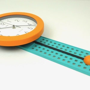 Rare 80s Postmodern memphis age Pendulum wall clock by Mebus