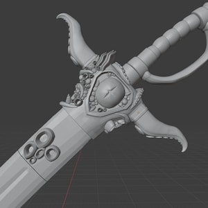 May include: A silver sword with a detailed handle featuring an eye and various sea-life motifs. The handle is adorned with a spiral design and a tentacle-like grip.