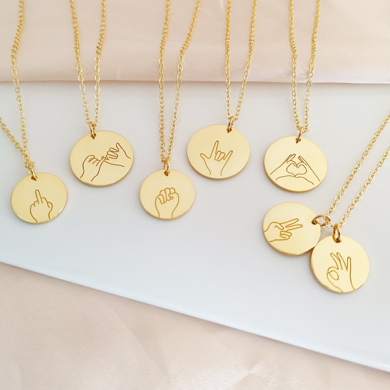 OUTLINE GESTURES NECKLACE - GOLD