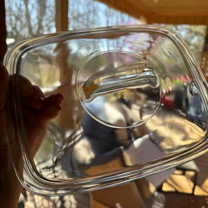 May include: A set of three ceramic mugs with a speckled, matte finish. The mugs are in shades of cream, light gray, and dark gray. Each mug has a simple, minimalist design, perfect for coffee or tea.