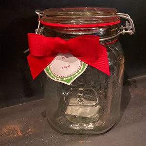 Bote de Navidad con tapa de alambre y forma de muñeco de nieve de Anchor Hocking