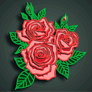 May include: A layered paper art piece featuring three red roses with pink shading and green leaves. The roses are in full bloom, with detailed petals and a dark background.