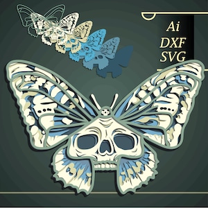 Puede incluir: Diseño de arte en papel en capas de una mariposa con cara de calavera, en tonos crema, azul y gris. La imagen incluye el texto "Ai, DXF, SVG". El diseño de la mariposa está sobre un fondo verde oscuro.