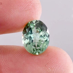 10 x 12 MM Flawless 9.10 Ct Natural Bi-Color Teal Sapphire GIT Certified Heart Touching Oval Cut Gemstone Use Making Ring Pendent Tool