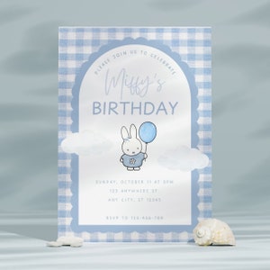 May include: Blue and white gingham birthday invitation with a cartoon bunny holding a blue balloon. The invitation says "Please join us to celebrate Miffy's Birthday" and includes the date, time, and RSVP information.