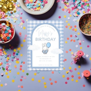 May include: A blue and white gingham patterned invitation with a white scalloped border. The invitation says "Please join us to celebrate Miffy's Birthday". A cartoon bunny with a blue balloon is in the center of the invitation. The invitation includes the date, time, address, and RSVP information.