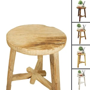May include: A round wooden stool with a natural finish and a unique X-shaped base. The stool is made of solid wood and has a rustic, vintage look.