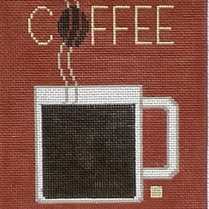 May include: A stitched artwork featuring a coffee cup with steam rising from it. The cup is filled with dark liquid, and the word "COFFEE" is stitched above it. The background is a reddish-brown color.