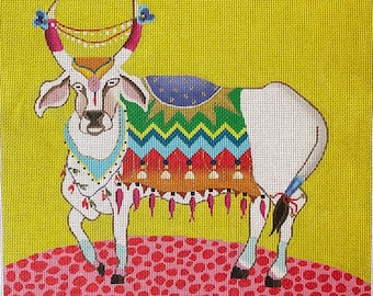 Witte koe met draden, kleuren van lof