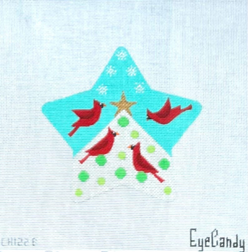 May include: A hand-painted canvas featuring a turquoise star shape with a gold star at the top. Four red cardinal birds are depicted around a white Christmas tree shape with green polka dots. The background is a light blue.