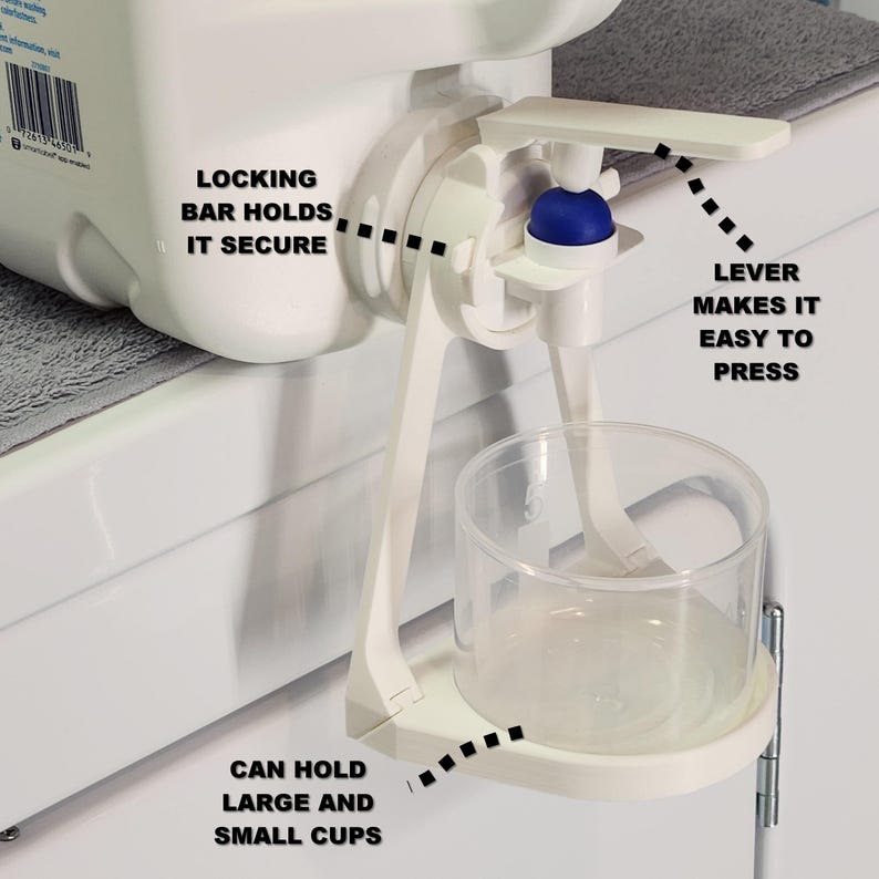 May include: White plastic water dispenser with a lever to dispense water. The dispenser has a locking bar to secure the bottle and a cup holder to hold cups of various sizes. The text "LOCKING BAR HOLDS IT SECURE" and "LEVER MAKES IT EASY TO PRESS" are visible on the image.