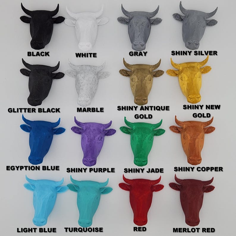 May include: A set of 14 bull head wall decor pieces in various colors and finishes, including black, white, gray, shiny silver, glitter black, marble, shiny antique gold, shiny new gold, Egyptian blue, shiny purple, shiny jade, shiny copper, light blue, turquoise, red, and merlot red.