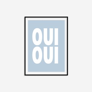 May include: A light blue framed print with the word "OUI" repeated twice in white bold letters.