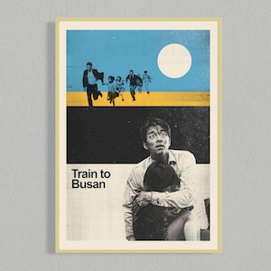 May include: A vintage-style poster for the movie "Train to Busan". The poster features a dark blue and yellow color scheme with a black and white image of a man holding a woman in his arms. The text "Train to Busan" is in bold, white letters.