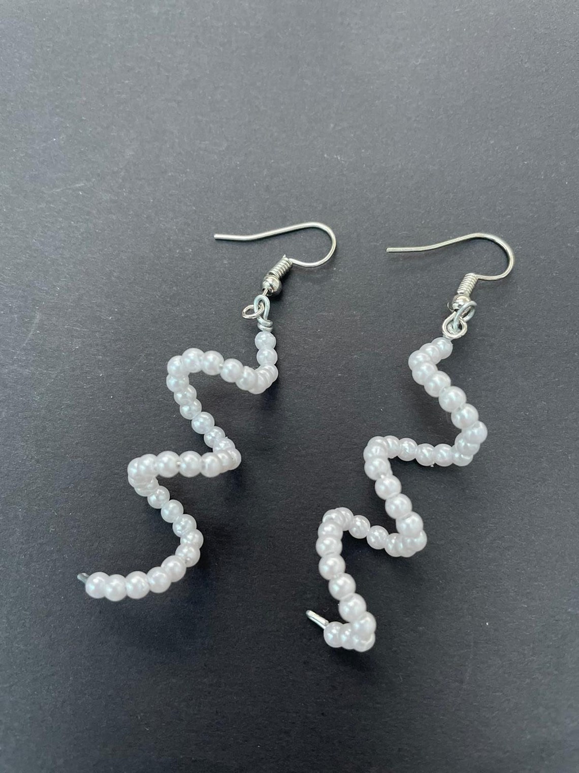 Beaded drop spiral earrings colourful handmade Etsy