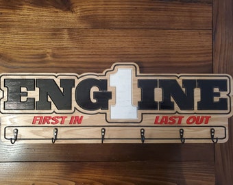 Custom Fire Department Coat Rack, Key Rack, Radio Strap Rack, Bell cap rack. This is a customizable coat rack for a Firefighter.