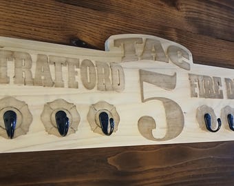 Custom Fire Department Coat Rack, Key Rack, Radio Strap Rack, Bell cap rack. This is a customizable coat rack for a Firefighter, Fire Dept