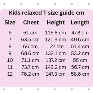 May include: A size guide for kids' relaxed T-shirts, with measurements in centimeters. The guide includes sizes 6 through 12, detailing chest, height, and length measurements for each size. The text is displayed on a pink background.
