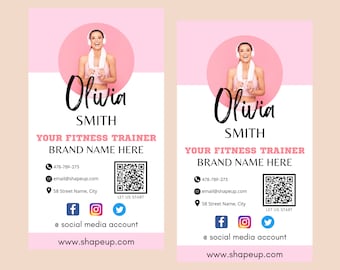 May include: Pink business card with a photo of a woman wearing headphones and a white towel around her neck. The text on the card reads "Olivia Smith, Your Fitness Trainer, Brand Name Here, 478-789-275, email@shapeup.com, 58 Street Name, City, Let Us Start, @ social media account, www.shapeup.com".