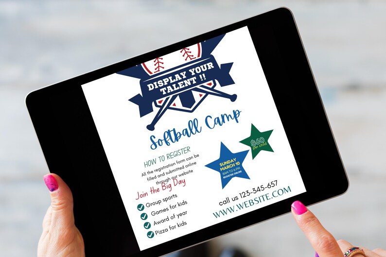 May include: A digital tablet displaying a softball camp flyer with a baseball graphic, the text "DISPLAY YOUR TALENT!!", "Softball Camp", "HOW TO REGISTER", "Join the Big Day", "Group sports", "Games for kids", "Award of year", "Pizza for kids", and "WWW.WEBSITE.COM".