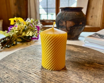 Spiral candle made of beeswax, handmade