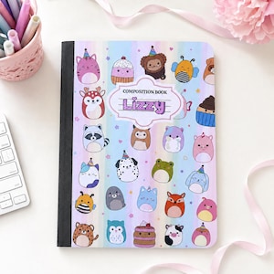 May include: A composition book with a pastel rainbow striped background featuring various cartoon animal characters and treats. A central white label with a purple border displays the text COMPOSITION BOOK and the name Lizzy in purple letters.
