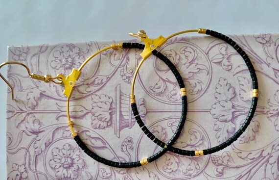 The Small Black Hoop Earrings in Gold (Pierced)