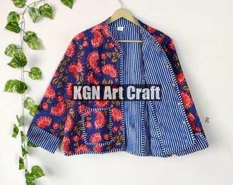 May include: A blue and red floral print jacket with a striped lining. The jacket has a button closure and a pocket on the left side. The text "KGN Art Craft" is visible on the jacket.