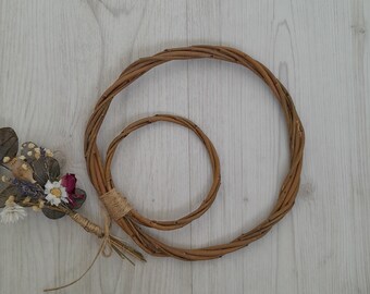 Brown willow hoops for floristry and crafts, double hoop thin wreath base. Wicker hoop in a hoop, hanging willow rings.