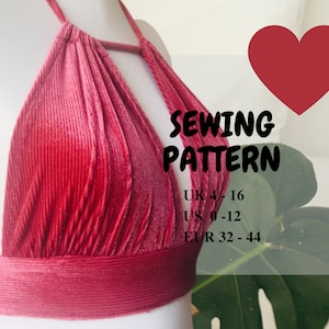 May include: A red halter top with a textured, ribbed fabric. The image includes the text "SEWING PATTERN" and size ranges in UK, US, and EUR sizes. A red heart is in the upper right corner.