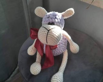 A toy. crochet. a sheep. sheep crocheted children's toys handmade