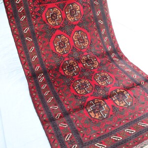 Vintage Afghan Baluchi Rug: Handmade Wool Oriental Carpet (3.8 ft x 6.0 ft)