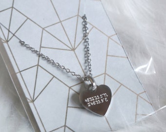 Disneyland Paris heart-shaped necklace with coordinates of the Castle