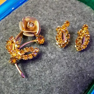 Vintage Unmarked Flower Brooch and Clip-On Earring Set with Clear and Yellow Color Rhinestones