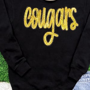 Vêtements de l'école des couguars. Vêtements de l'équipe Cougars. Patch à sequins