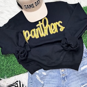 Panthers school spirit wear. Panthers team gear. Sequin patch
