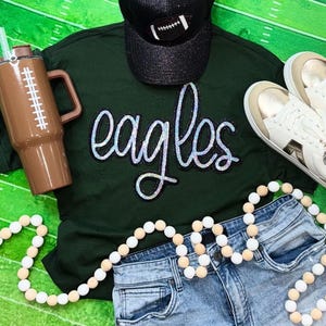 Felpa con paillettes Eagles: mascotte della scuola, paillettes argento o oro