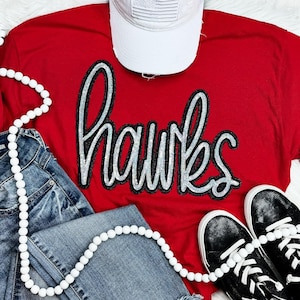 Hawks shirt. Hawks sweatshirt. hawks. Hawks mascot. Hawks basketball. Teacher. School spirit. Custom. Sequin patch.