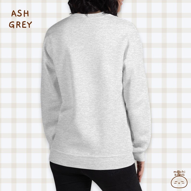 K&ouml;nnte beinhalten: Ein hellgrauer Sweatshirt mit langen &Auml;rmeln und einem Rundhalsausschnitt. Der Sweatshirt ist aus einem weichen, bequemen Material gefertigt.