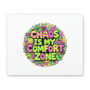 May include: A canvas print featuring the phrase "CHAOS IS MY COMFORT ZONE" in vibrant neon green, pink, and yellow. The text is surrounded by a colorful doodle design of cartoon aliens, smiley faces, and other whimsical elements.