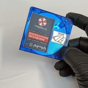 Resident Evil - Umbrella Corporation - T - Virus MO Disk - Mini Disc Prop - Coleccionable hecho a mano